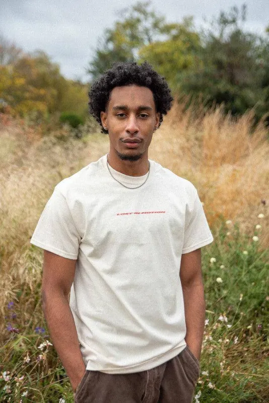 T-Shirt in Neutral With Lost In Motion Logo Print sold by Dream But Do Not Sleep