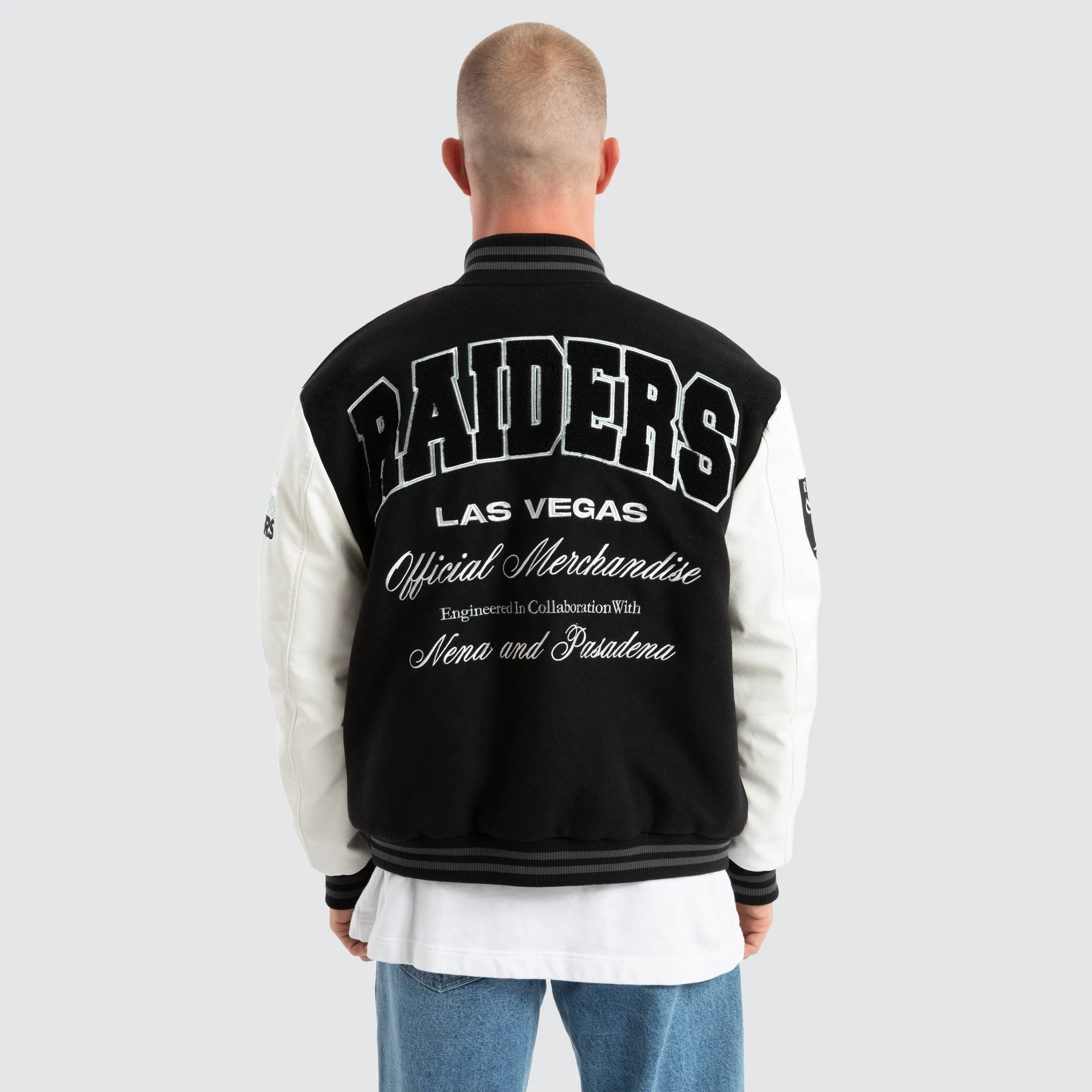Las Vegas Raiders Huddle Varsity Jacket Black/White sold by Nena and Pasadena