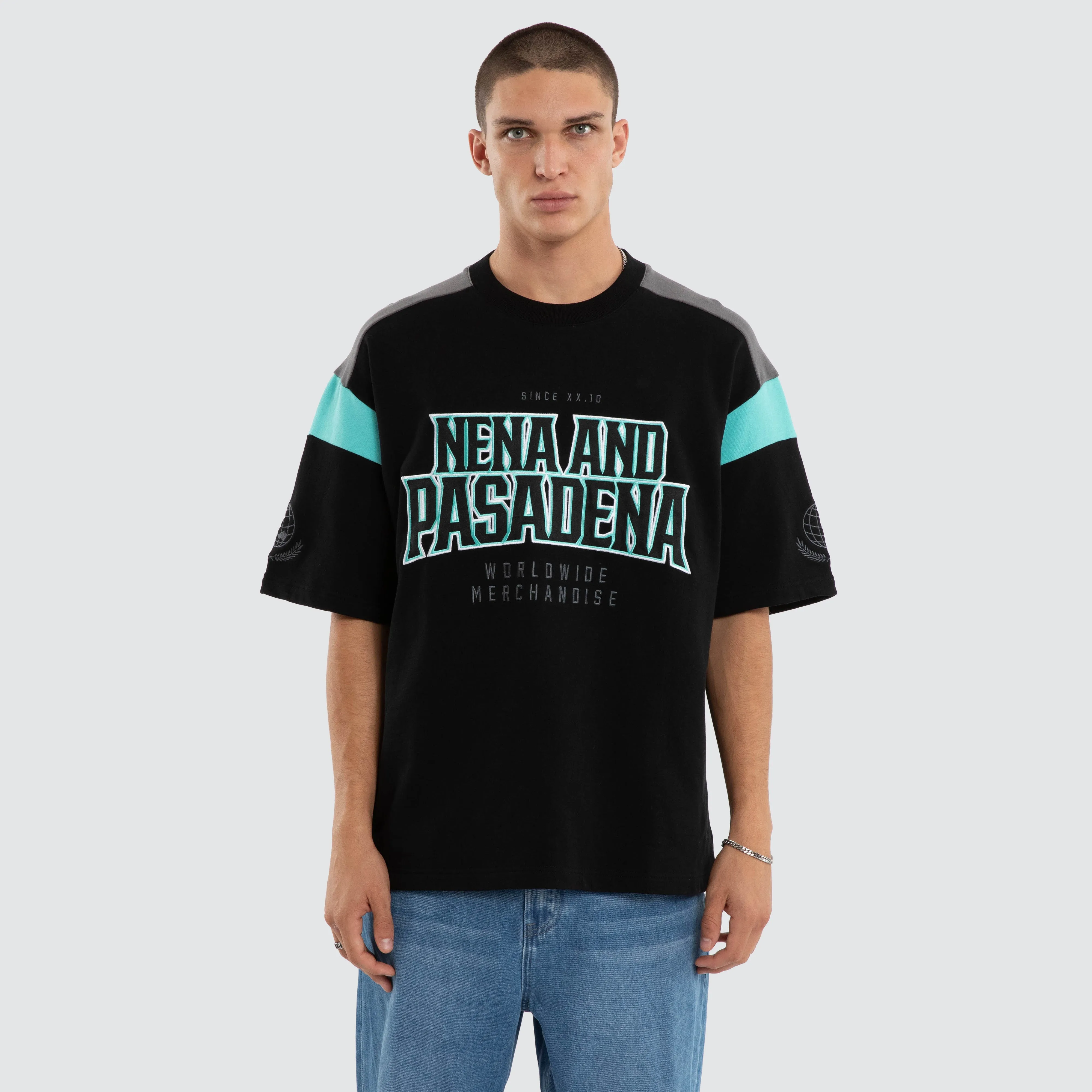 Conquer Loopback Raptor Tee Black/Turquoise sold by Nena and Pasadena