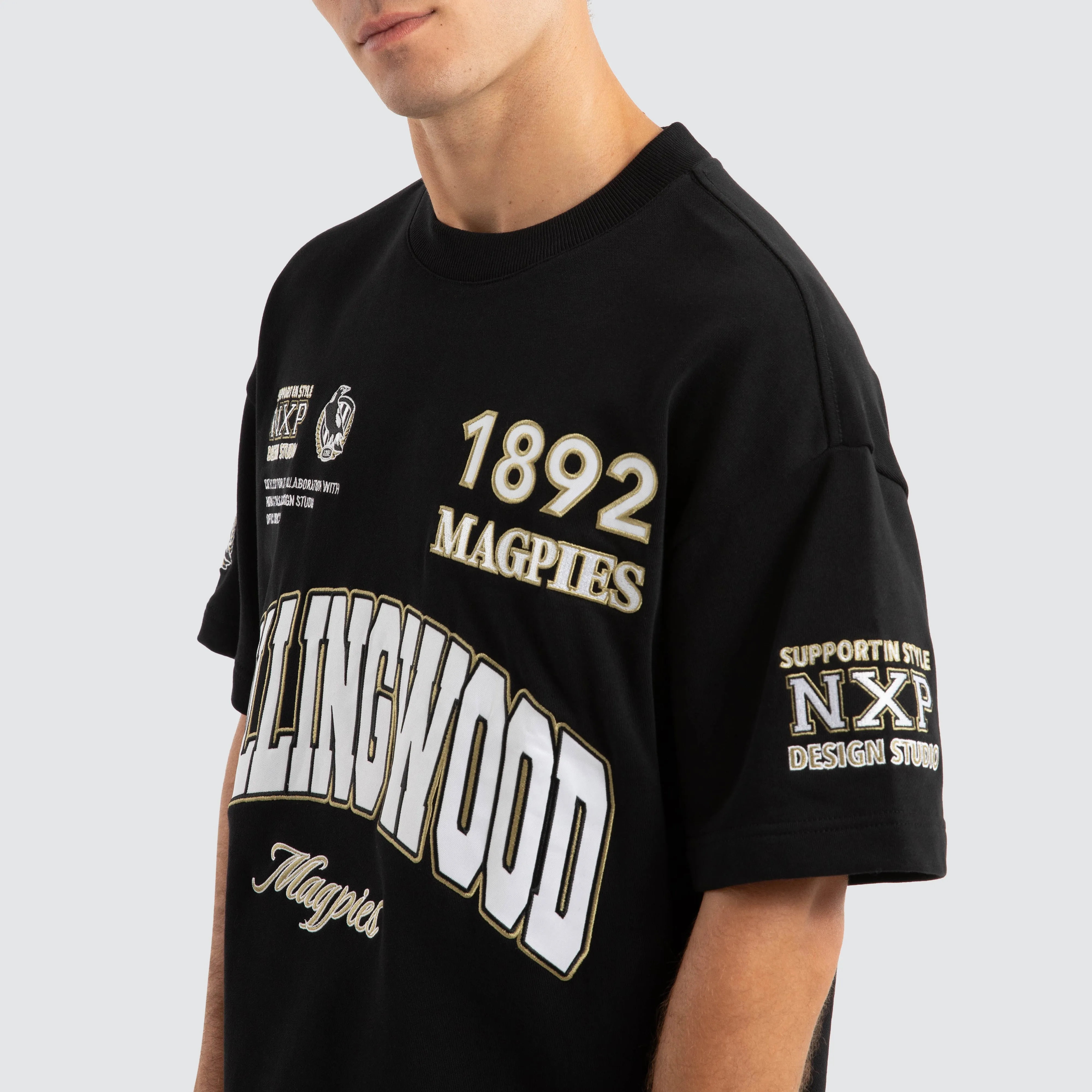 Collingwood Magpies AFL Academy Tee Jet Black sold by Nena and Pasadena product image thumbnail 5