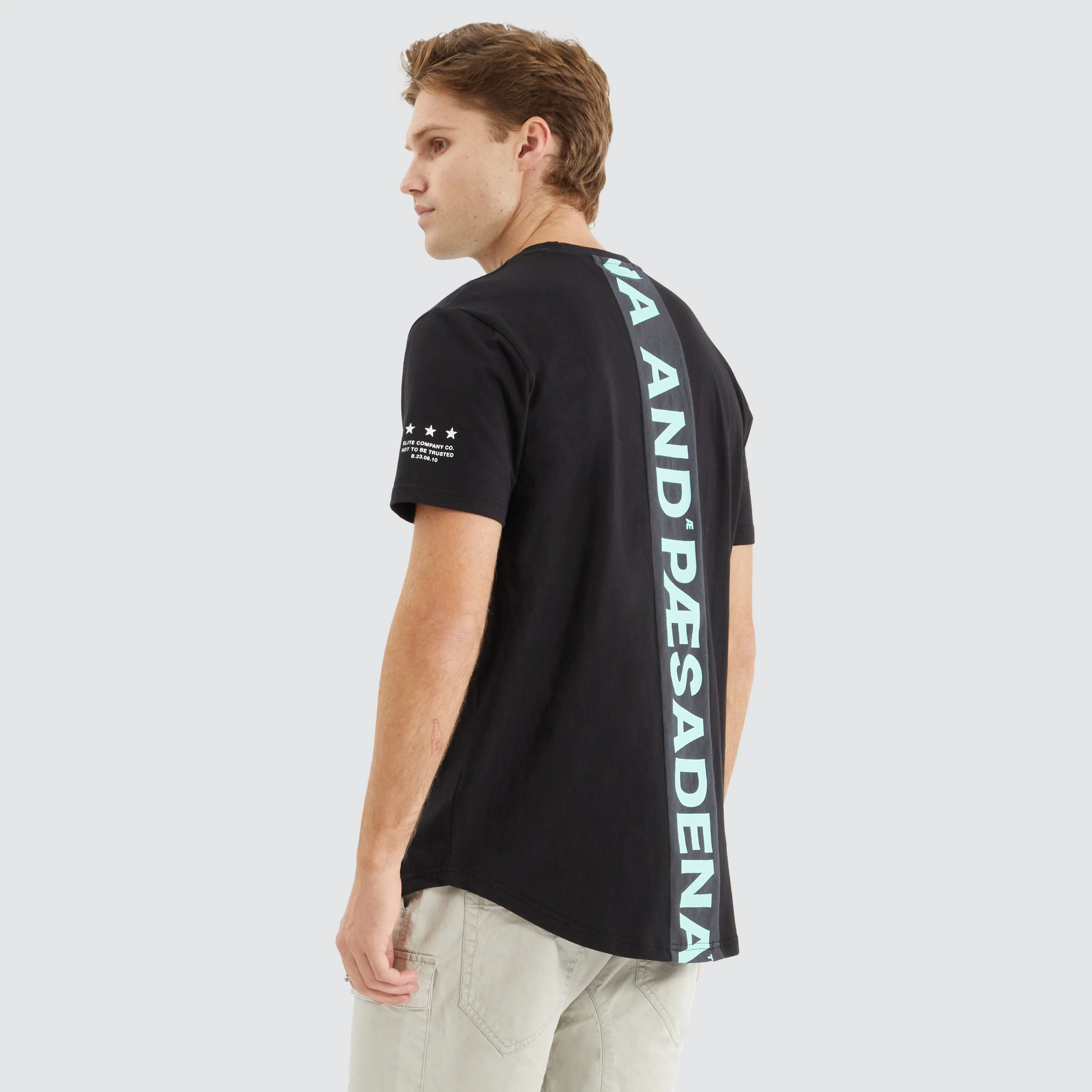 Extension Dual Curved Tee Black/Green sold by Nena and Pasadena