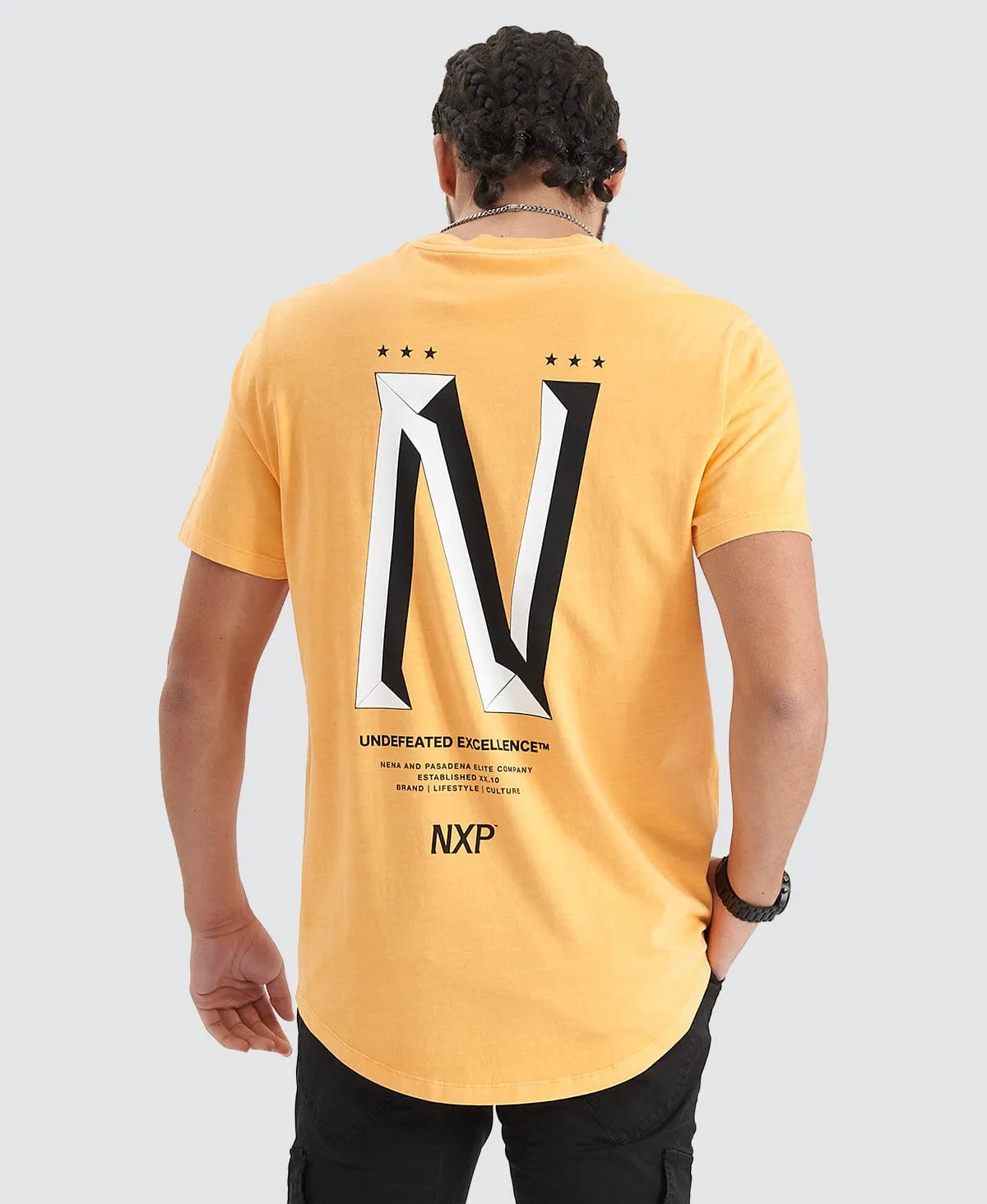 Alliance Tee Pigment Mock Orange sold by Nena and Pasadena