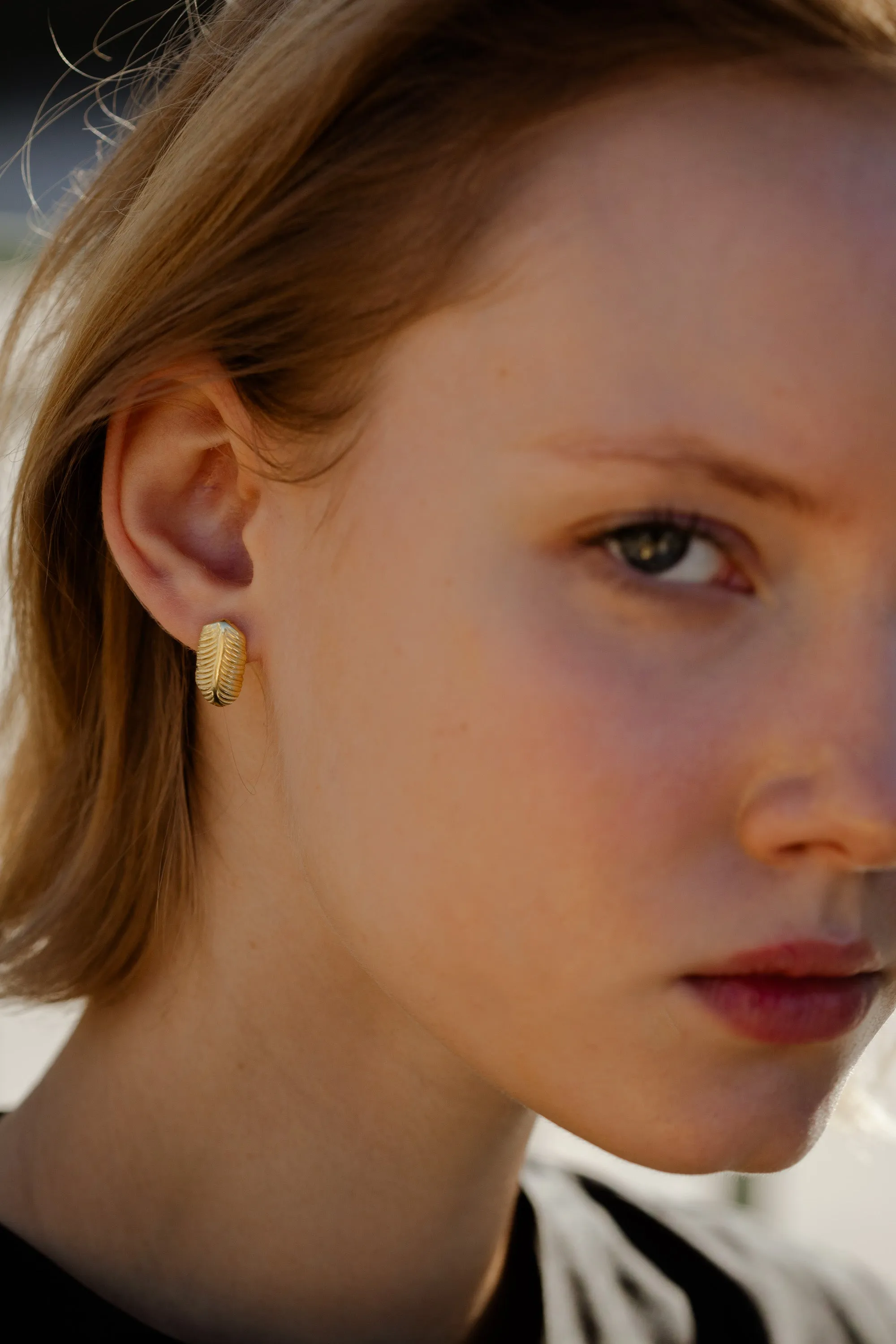 Tiny Feather Earrings sold by YSSO product image thumbnail 3