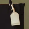 The Slim Luggage Tag Champagne sold by Poppy Barley