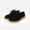 The Palm Springs Chukka Black sold by Poppy Barley