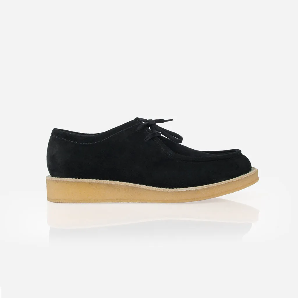 The Palm Springs Chukka Black sold by Poppy Barley