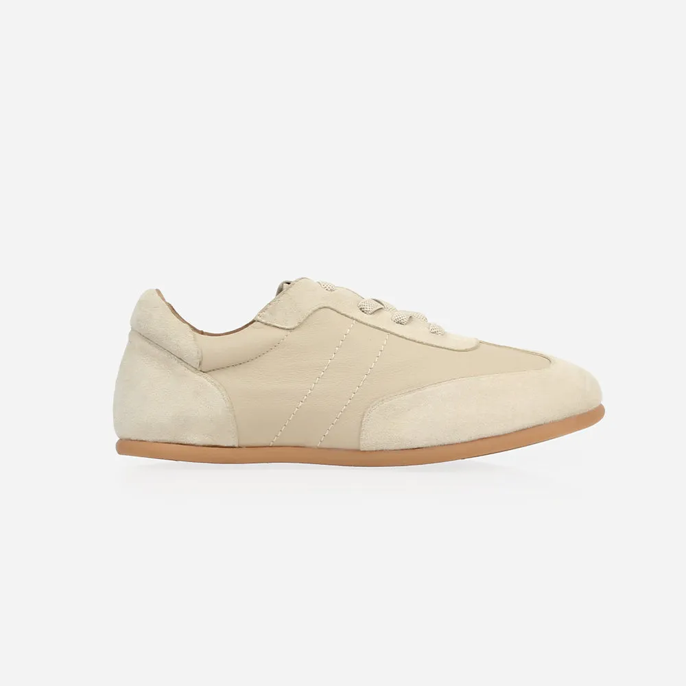 The Matchpoint Sneaker Oatmeal Pebble sold by Poppy Barley