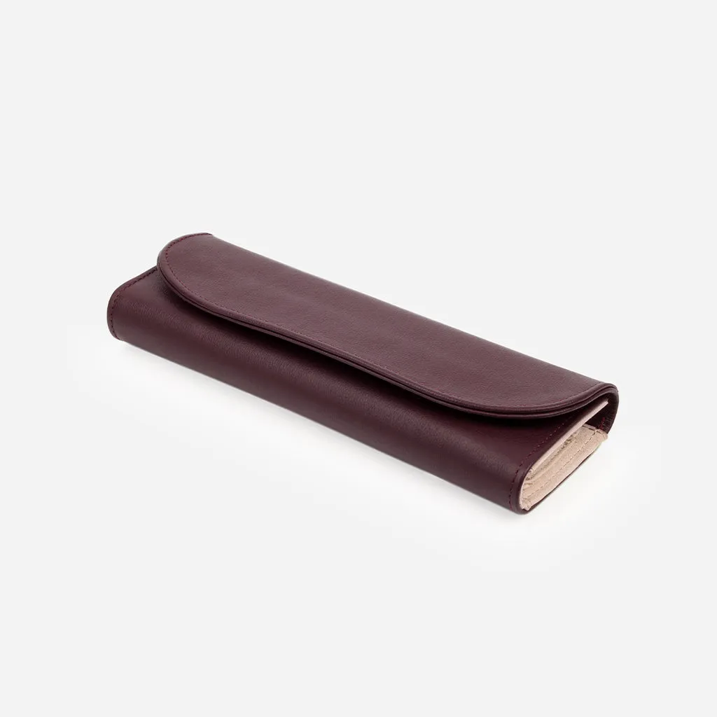 The Travel Jewelry Case Aubergine sold by Poppy Barley