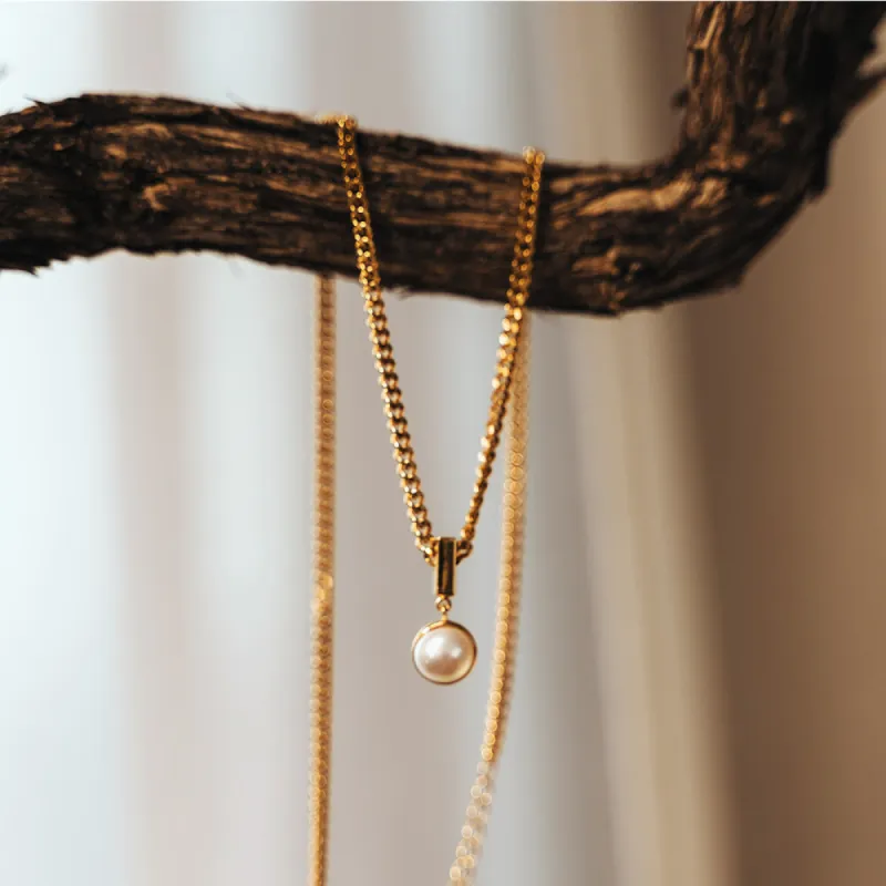 The Pearl Drop Charm sold by Poppy Barley