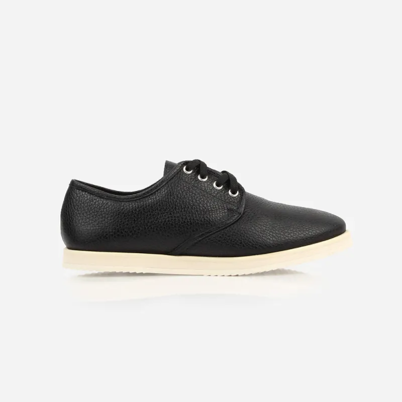 The Eyelet Sneaker Black with Black sold by Poppy Barley