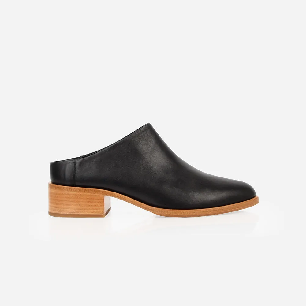 The Low Down Heeled Mule Black sold by Poppy Barley