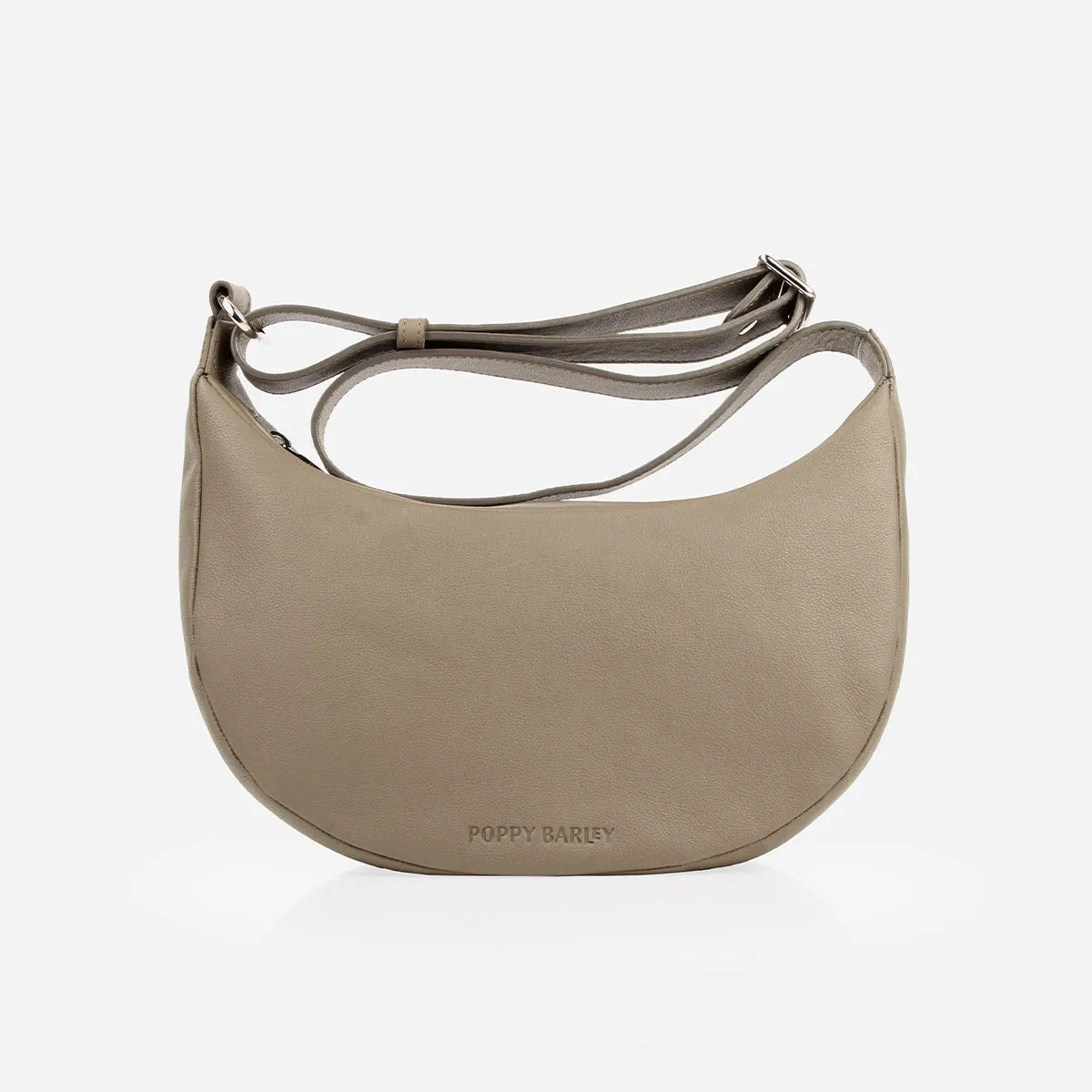 The Arc Crossbody Bag Truffle sold by Poppy Barley