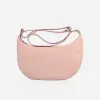 The Arc Crossbody Bag Blush sold by Poppy Barley