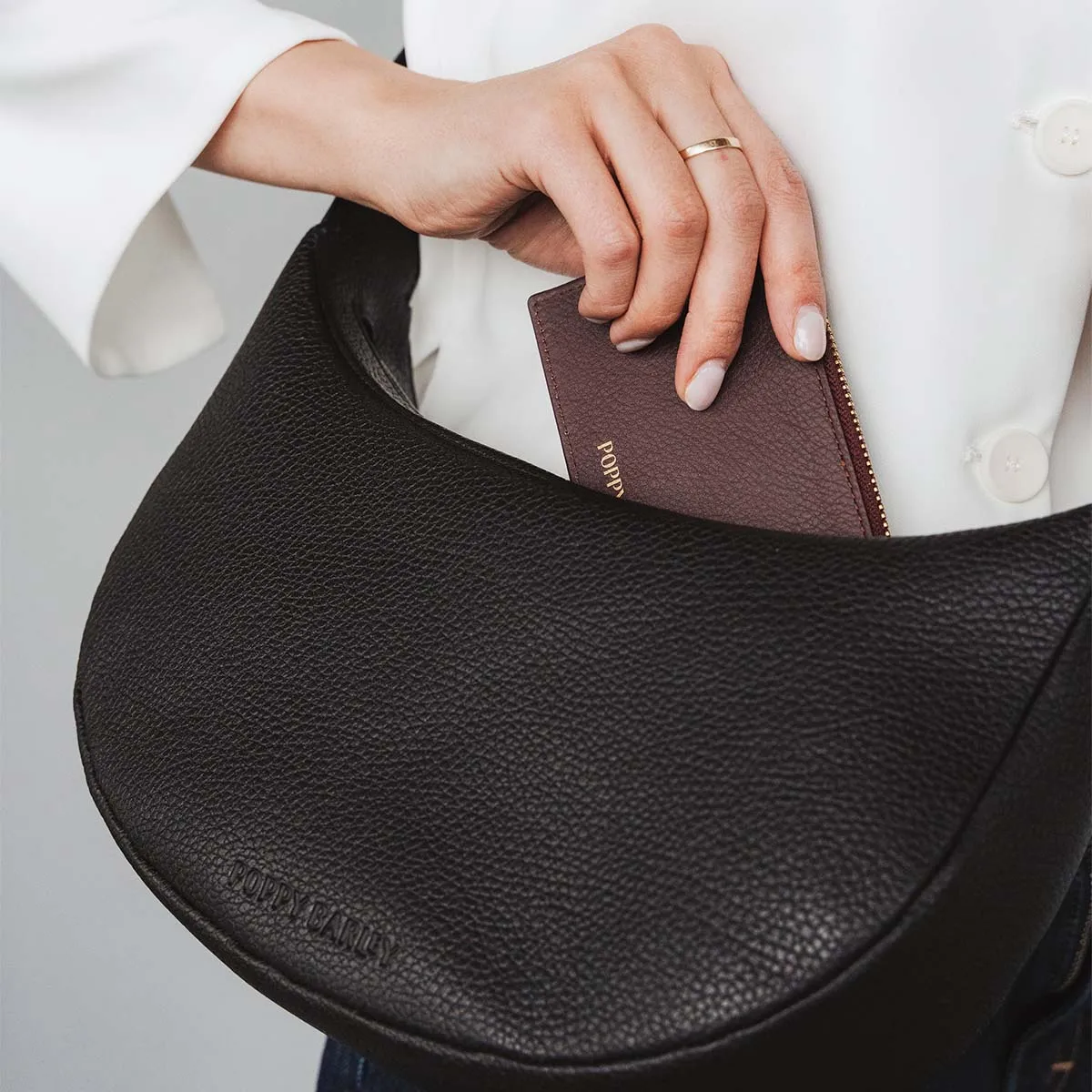 The Arc Crossbody Bag Black sold by Poppy Barley product image thumbnail 5