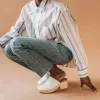 The West Coast Clog White sold by Poppy Barley