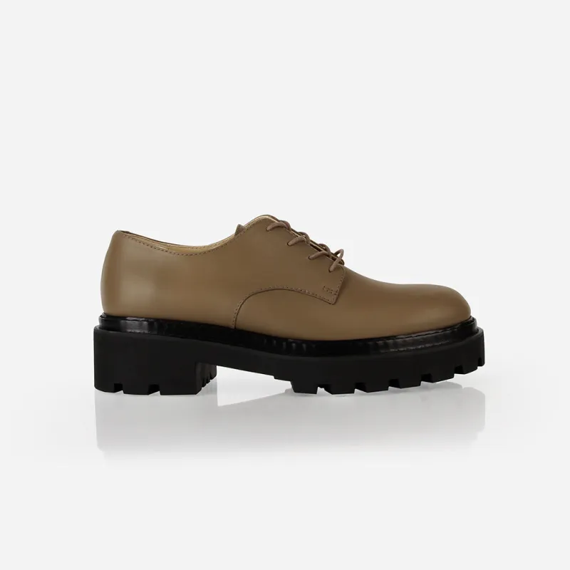 The Uniform Oxford Khaki sold by Poppy Barley