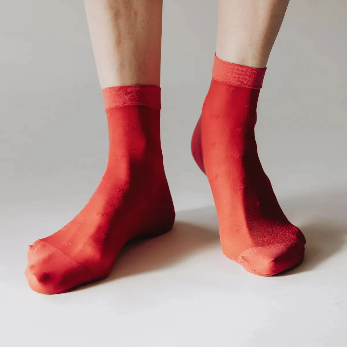 Rachel Micro Bow Pattern Sheer Socks in Cherry sold by Poppy Barley