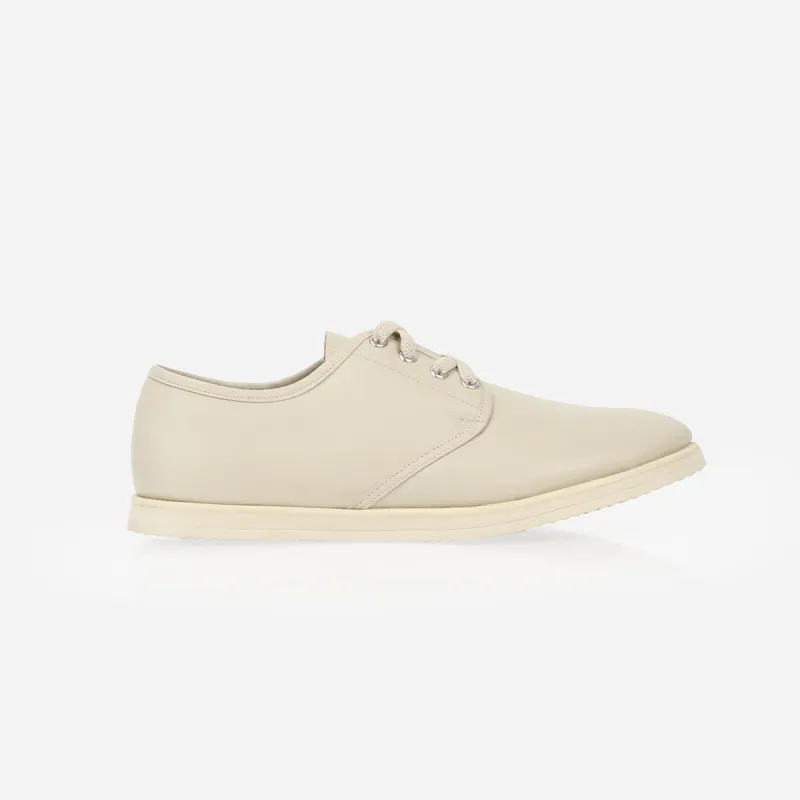 The Eyelet Sneaker Oatmeal sold by Poppy Barley