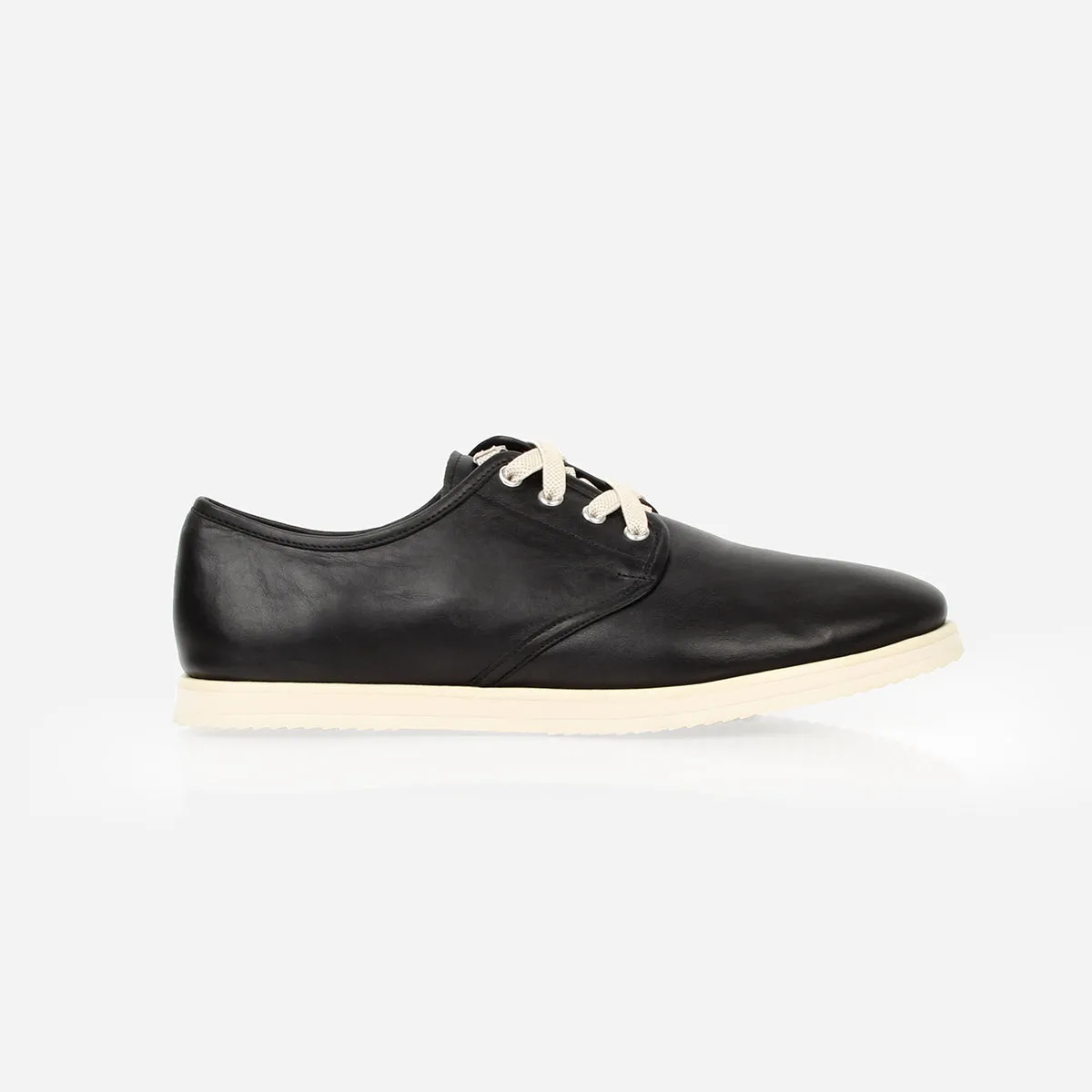 The Eyelet Sneaker Black sold by Poppy Barley
