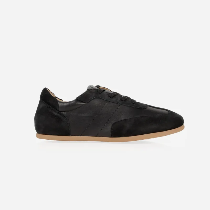 The Matchpoint Sneaker Black sold by Poppy Barley