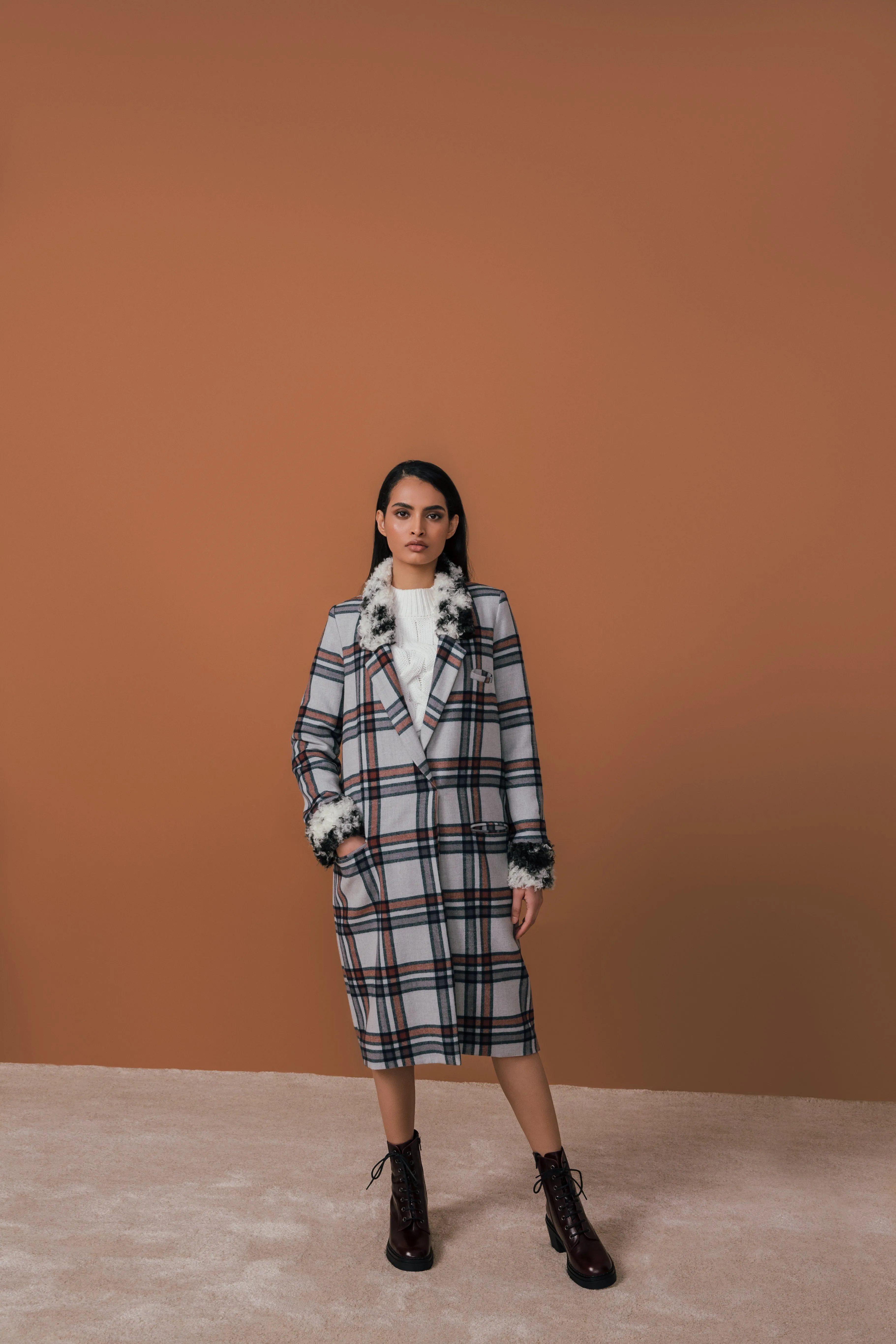 Plaid and Cow Cuff Coat sold by Hilary Macmillan