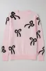 Bow Pattern Round Neck Loose Fit Sweater sold by The Barefoot Brunette Boutique