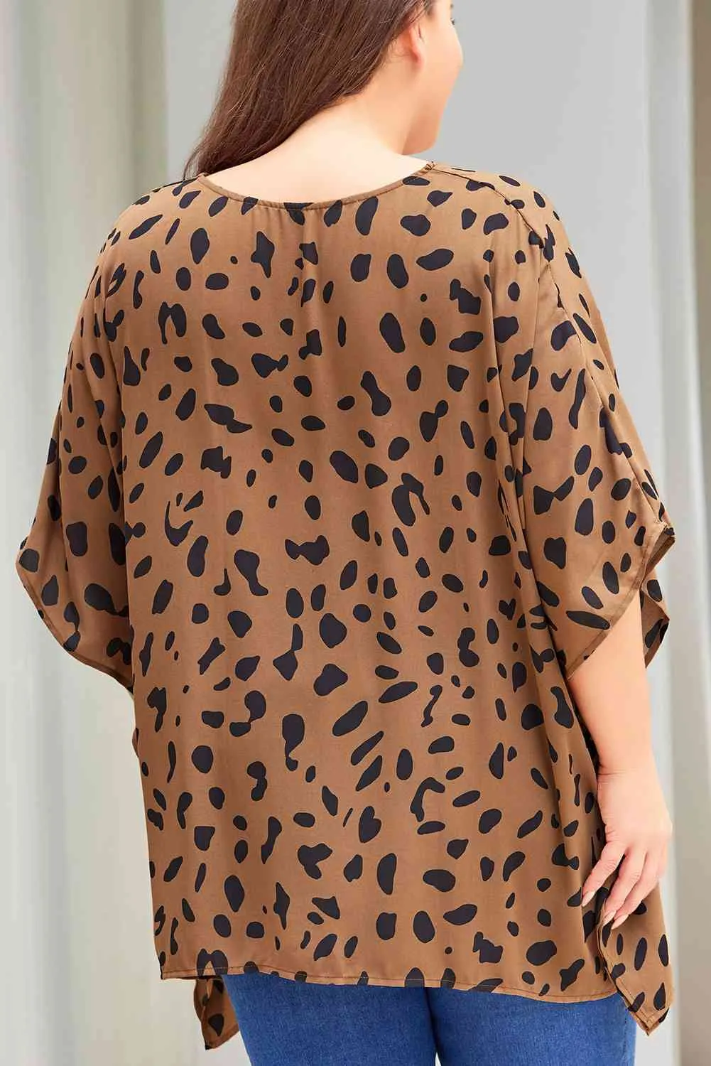 Plus Size Animal Print Handkerchief Hem Blouse sold by The Barefoot Brunette Boutique product image thumbnail 2