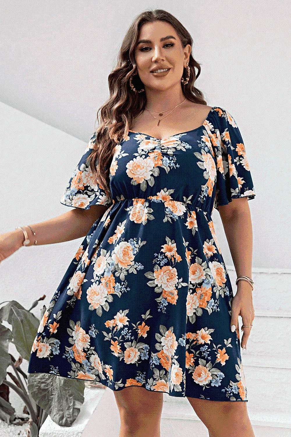Plus Size Floral Print V-Neck Flutter Sleeve Mini Dress sold by The Barefoot Brunette Boutique