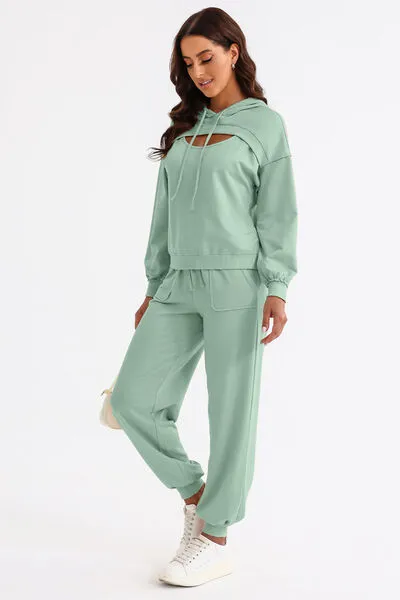 Cutout Drawstring Hoodie and Joggers Active Set sold by The Barefoot Brunette Boutique