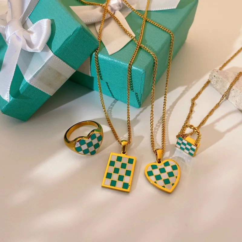 Checker Blue Necklace sold by House of Bling