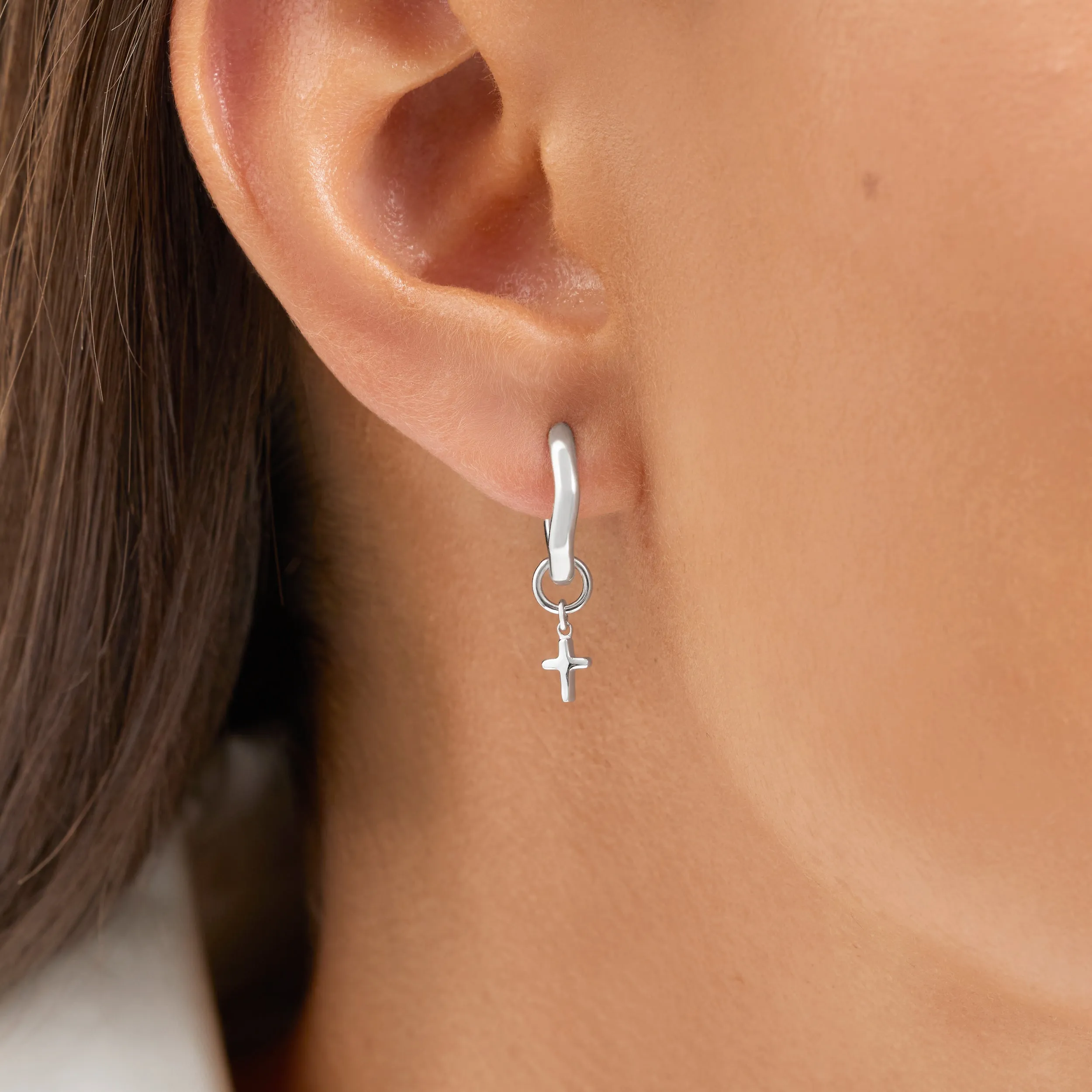 Fine Molten Cross Huggie Earrings (Silver) sold by Abbott Lyon product image thumbnail 2