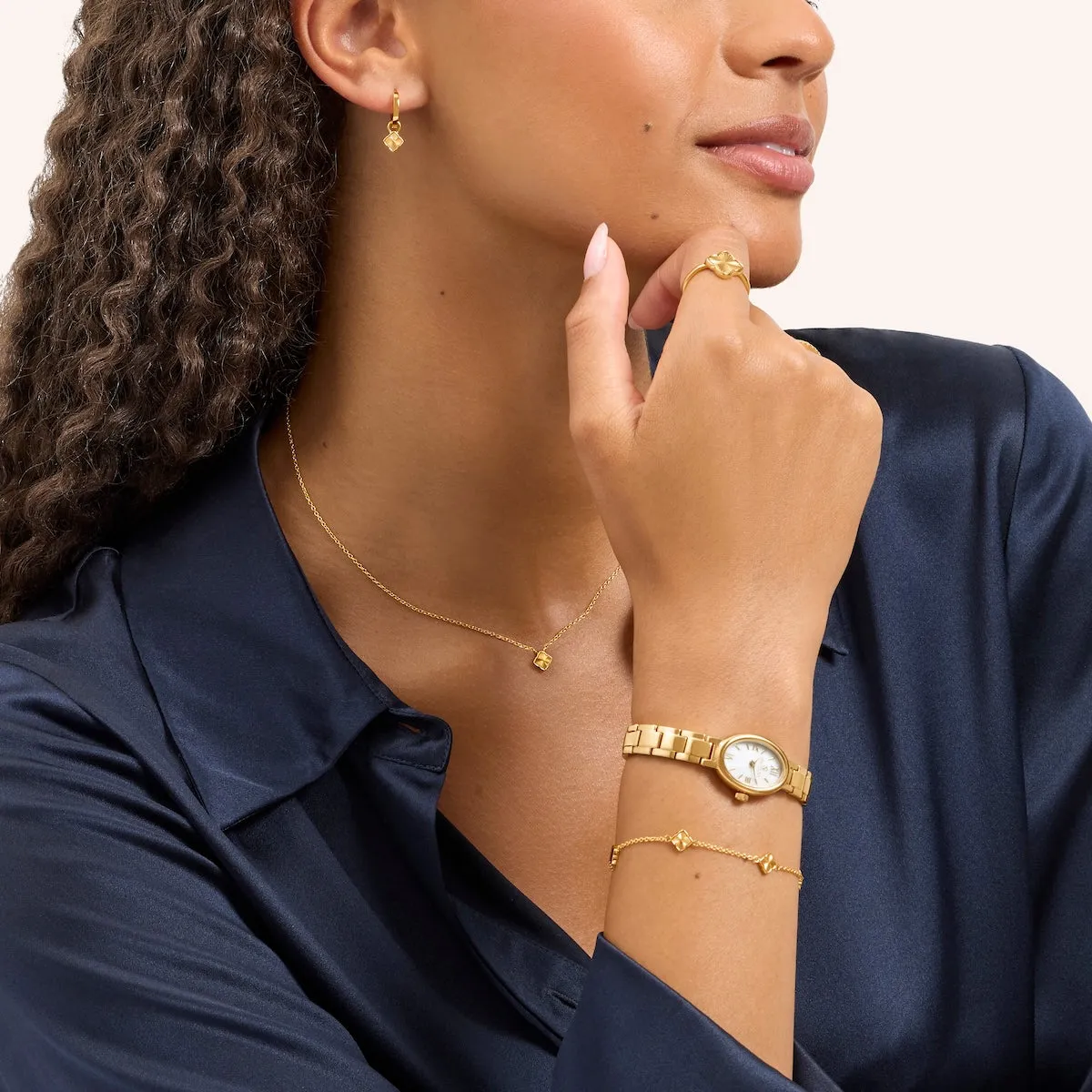 Fine Mini Fluted Clover Huggie Earrings (Gold) sold by Abbott Lyon product image thumbnail 3