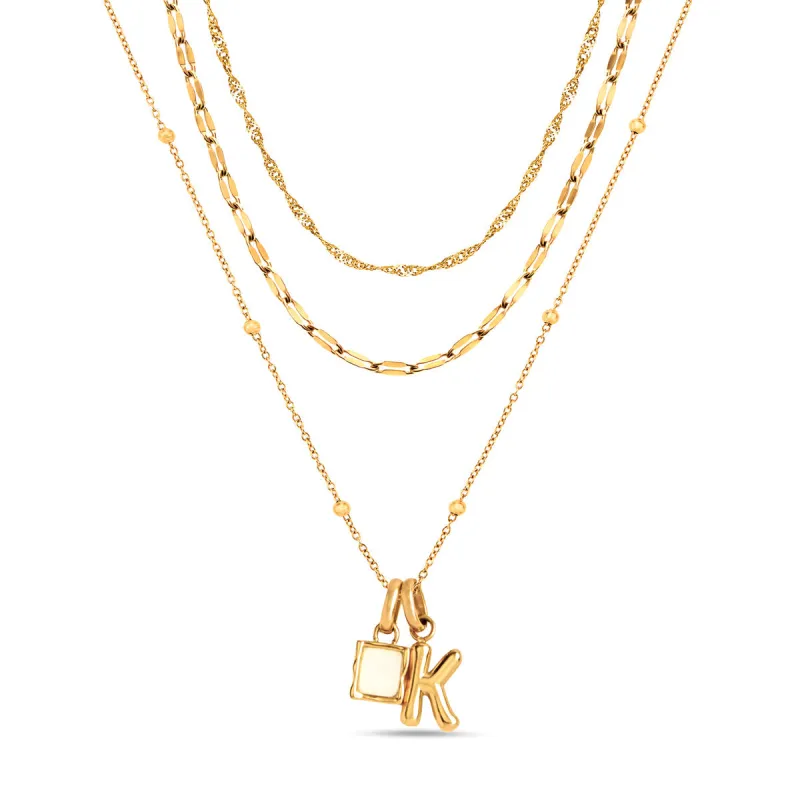 Mini Molten Initial & Moonstone Charm Layered Necklace Set (Gold) sold by Abbott Lyon