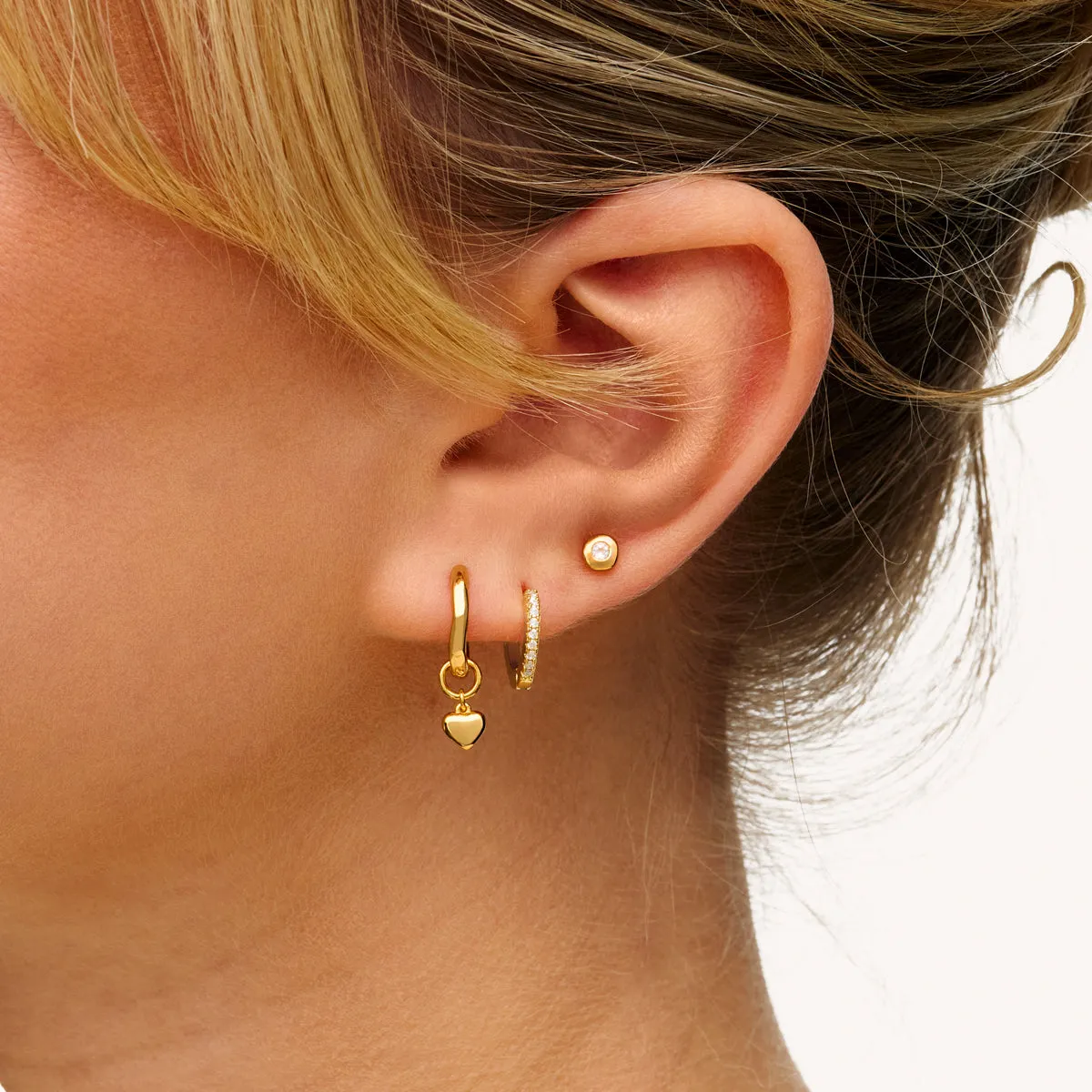 Fine Molten Heart Huggie Earrings (Gold) sold by Abbott Lyon product image thumbnail 3