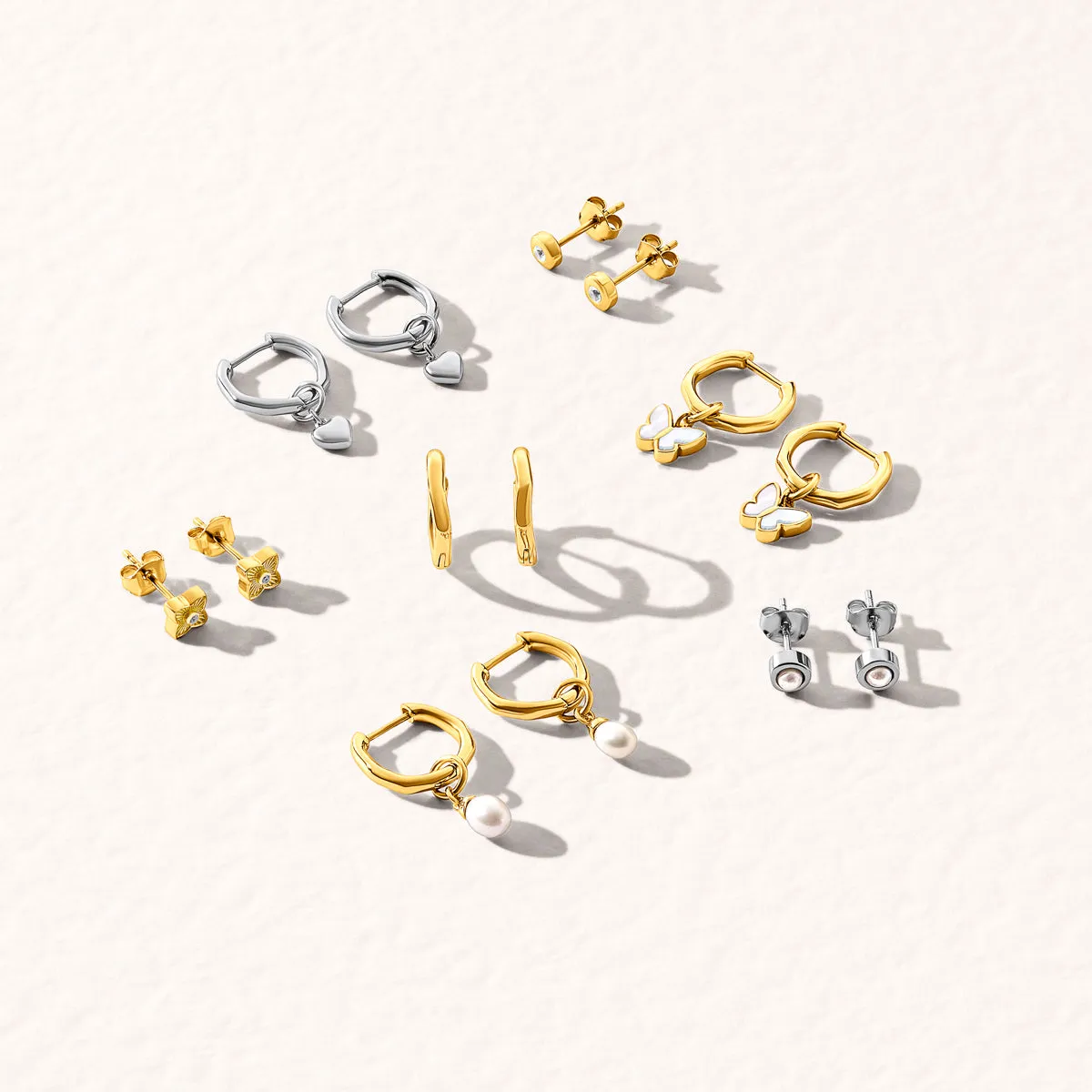 Fine Molten Huggie Earrings (Gold) sold by Abbott Lyon product image thumbnail 5