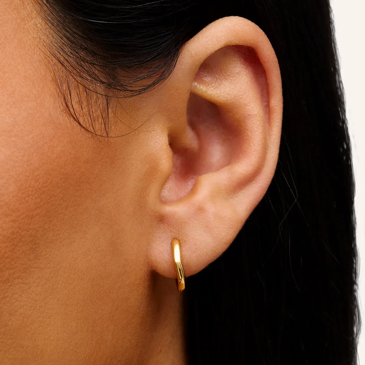 Fine Molten Huggie Earrings (Gold) sold by Abbott Lyon product image thumbnail 2