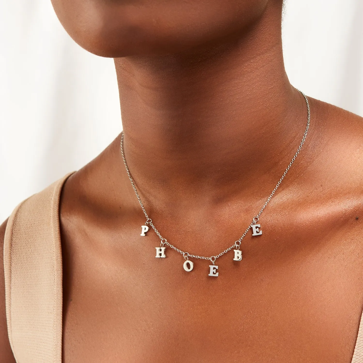 Mini Hanging Letter Name Necklace (Silver) sold by Abbott Lyon product image thumbnail 4