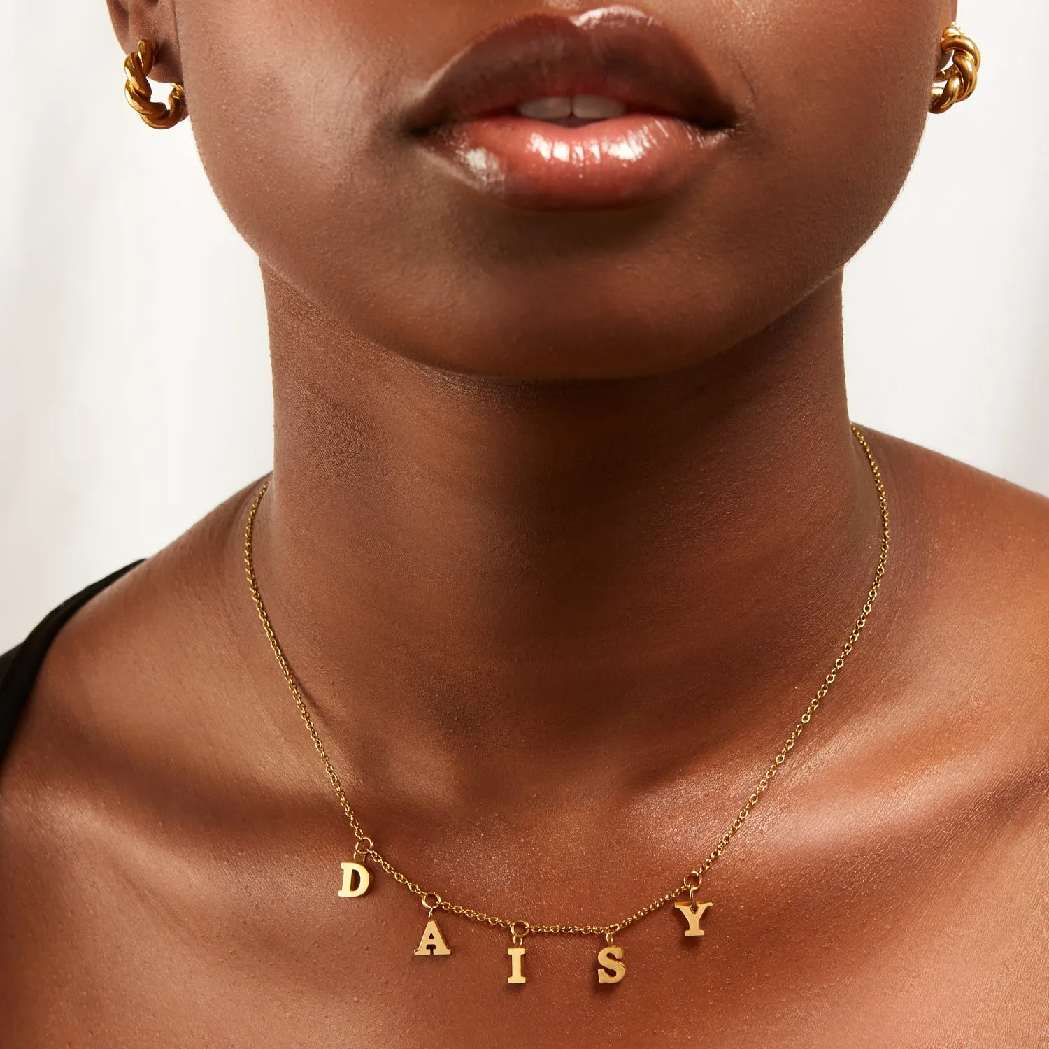 Mini Hanging Letter Name Necklace (Gold) sold by Abbott Lyon product image thumbnail 4