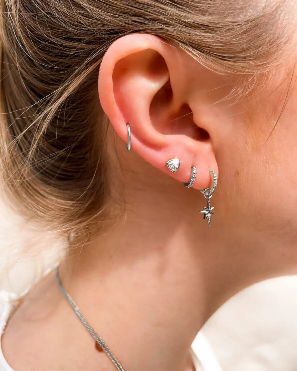 Sterling Silver Crystal Huggie Hoop Earrings (Silver) sold by Abbott Lyon product image thumbnail 4