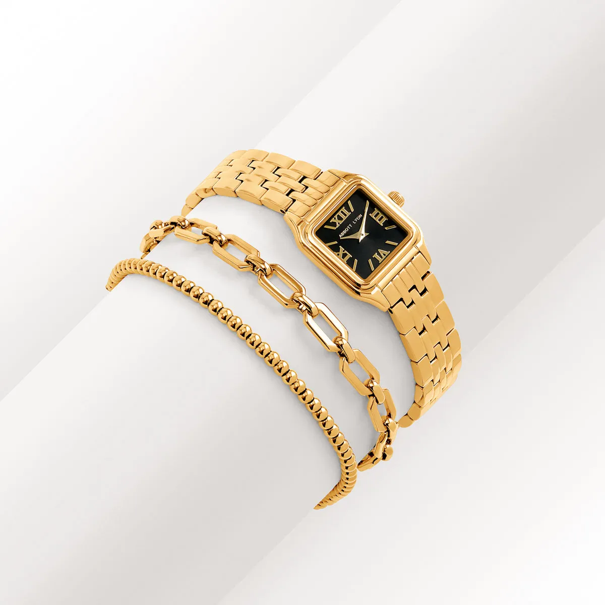 Black Essence Watch & Chain Bracelet Set (Gold) sold by Abbott Lyon