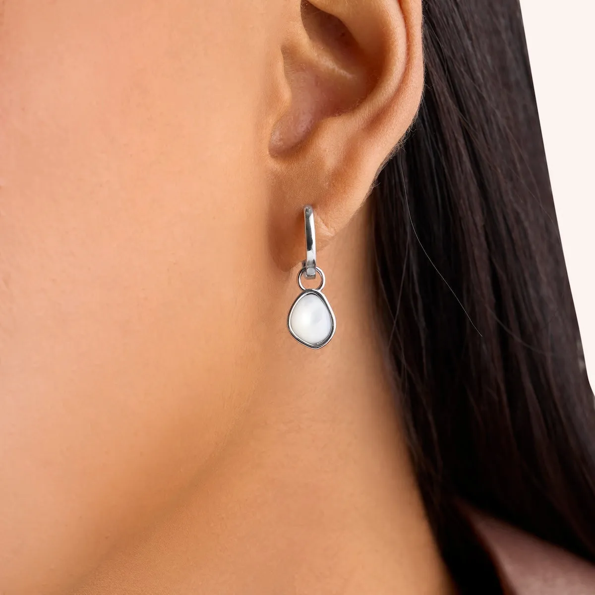 Organic Moonstone Huggie Earrings (Silver) sold by Abbott Lyon product image thumbnail 2