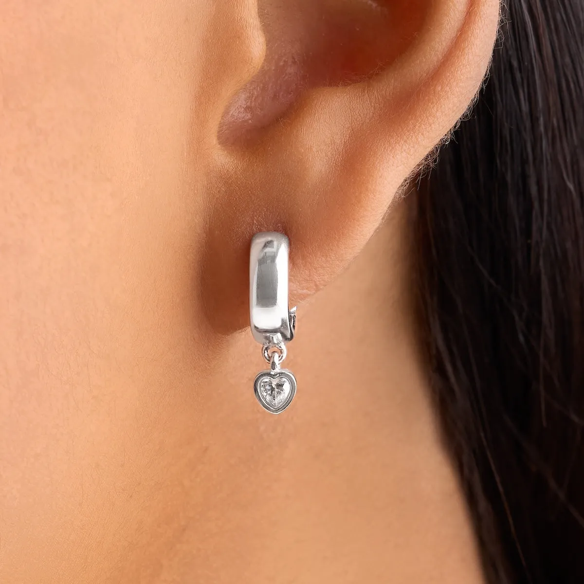 Chunky Heart Huggie Hoop Earrings (Silver) sold by Abbott Lyon product image thumbnail 2