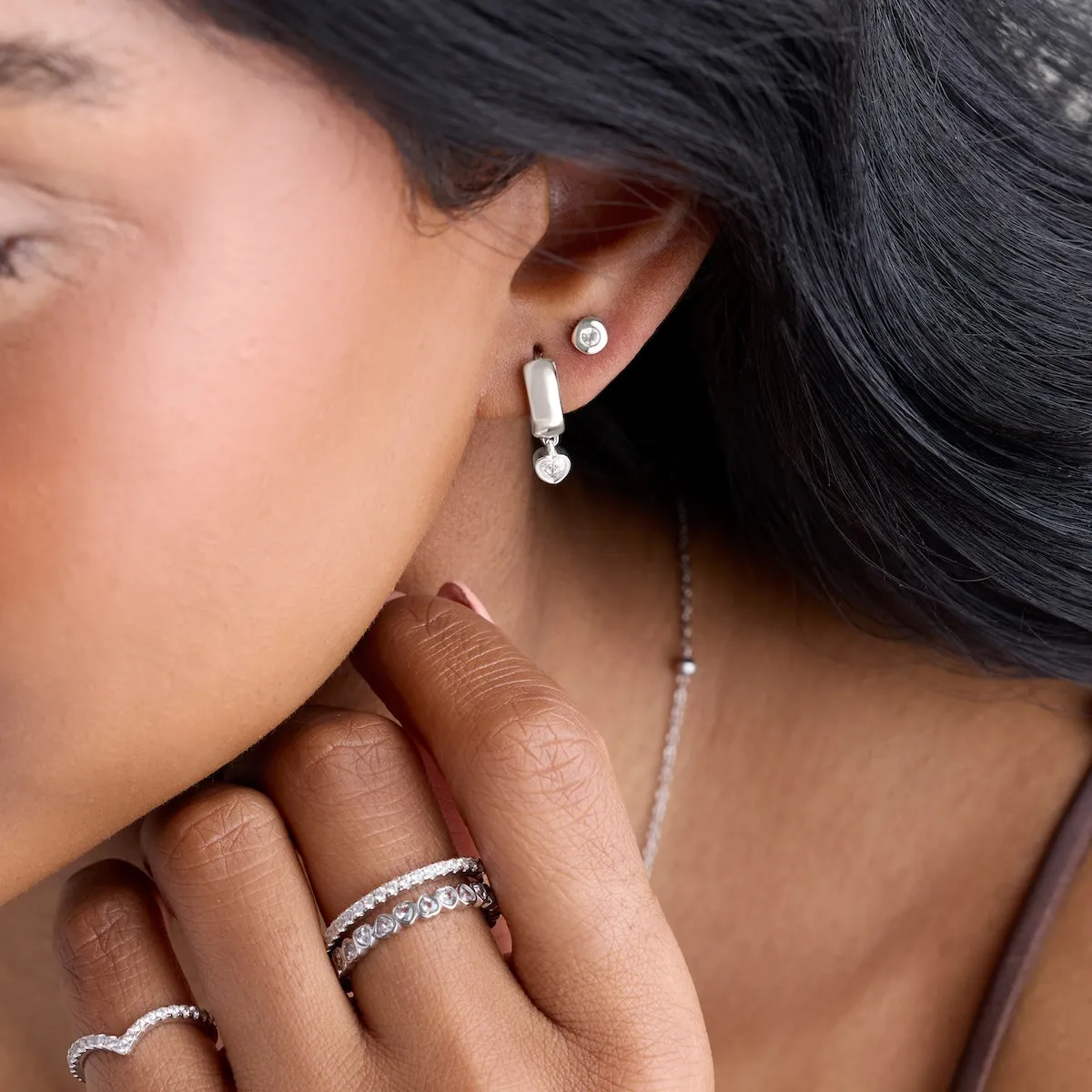 Chunky Heart Huggie Hoop Earrings (Silver) sold by Abbott Lyon product image thumbnail 4