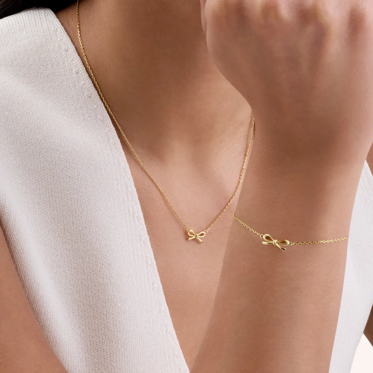 Fine Bow Jewellery Set (Gold) sold by Abbott Lyon product image thumbnail 2