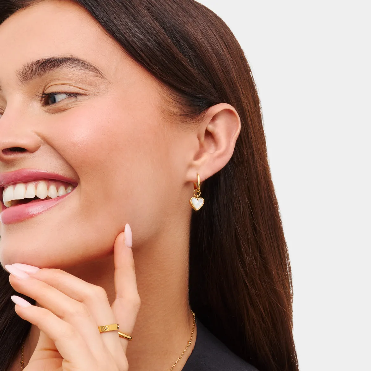 White Quartz Heart Huggie Earrings (Gold) sold by Abbott Lyon product image thumbnail 3