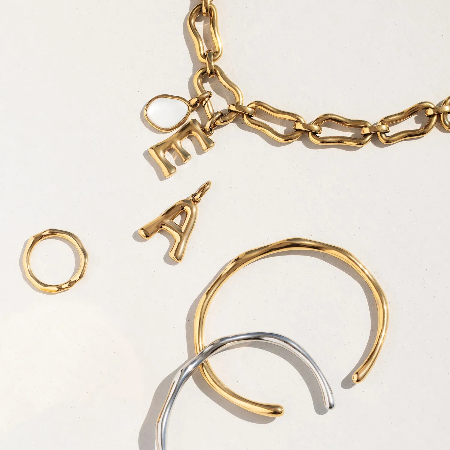 Molten Initial Pendant (Gold) sold by Abbott Lyon product image thumbnail 5