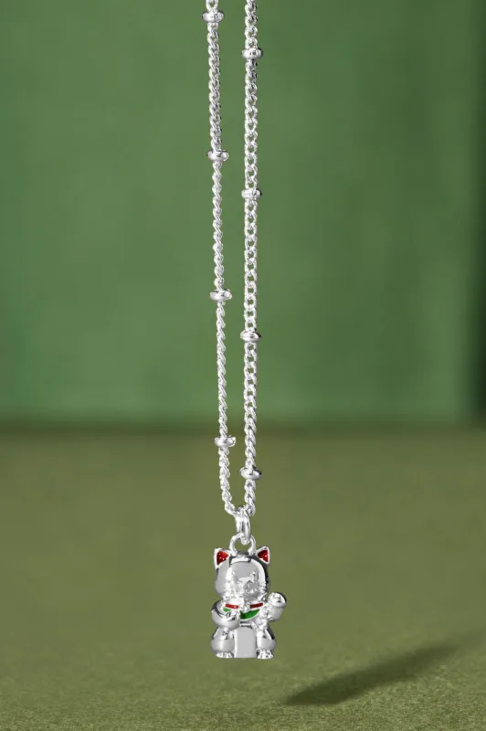 Lucky Cat Necklace sold by Estella Bartlett