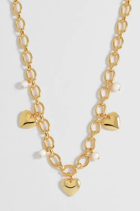 Pearl and Heart Charm Necklace sold by Estella Bartlett