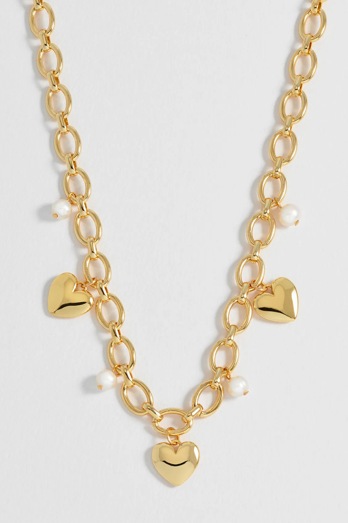 Pearl and Heart Charm Necklace sold by Estella Bartlett