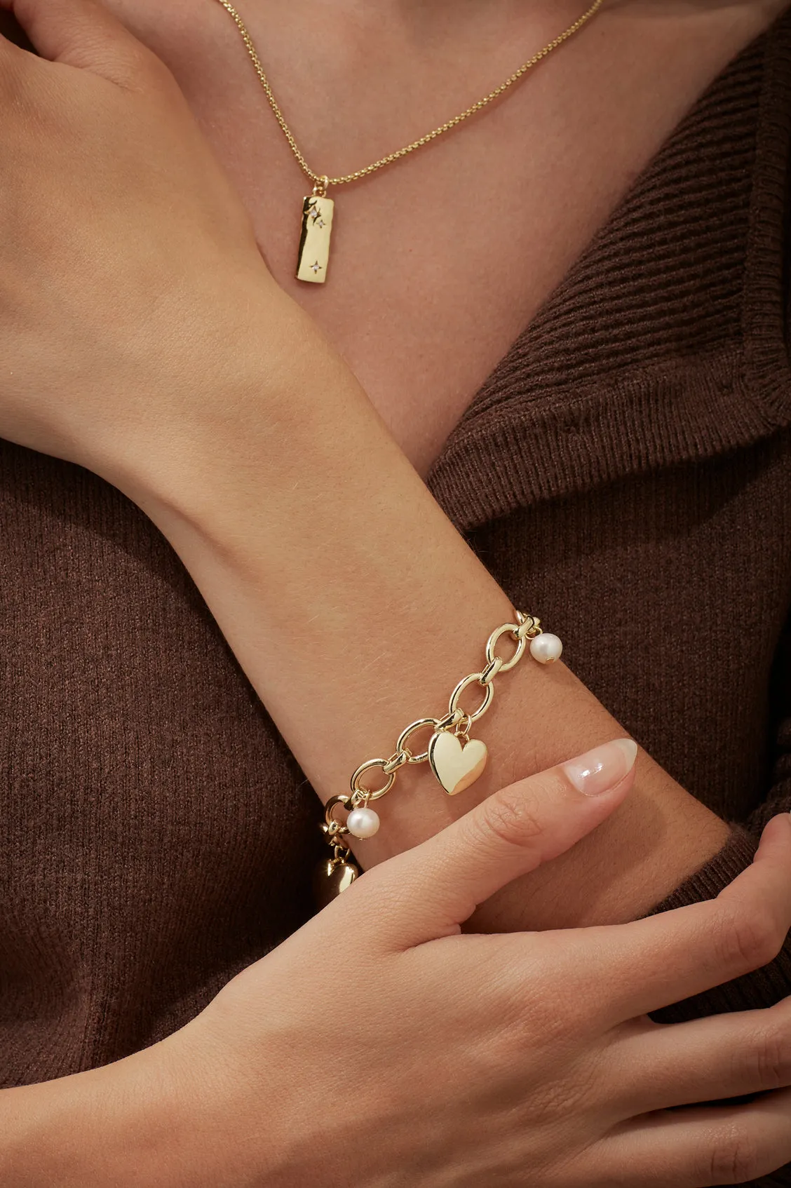 Pearl and Heart Charm Bracelet sold by Estella Bartlett product image thumbnail 2
